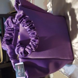 NWT Purple Satin Paparazzi purse.